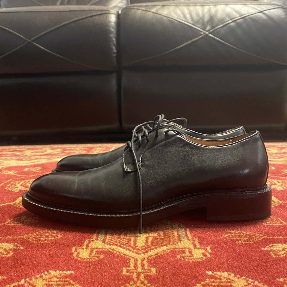 All black shoes with black shoe strings.